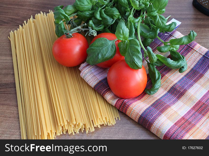 Ingredient for Italian pasta with tomato and basil spaghetti. Ingredient for Italian pasta with tomato and basil spaghetti