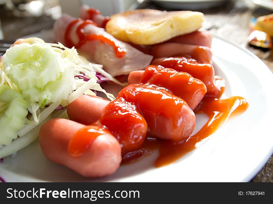 Sausages and Ham  with vegetables. Sausages and Ham  with vegetables