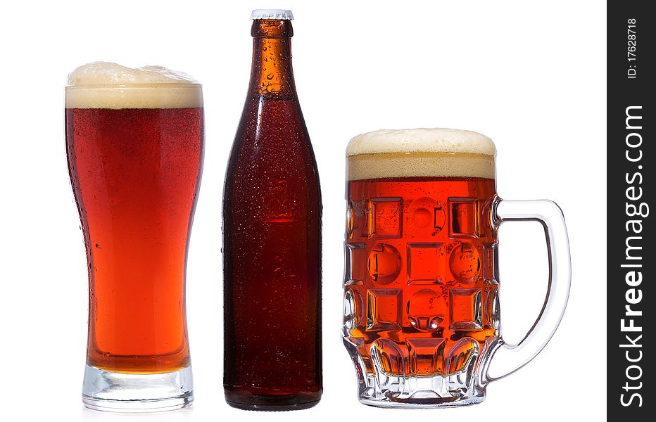 Bottle and glasses with beer on white background