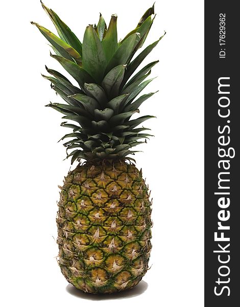 A pineapple set against a white background