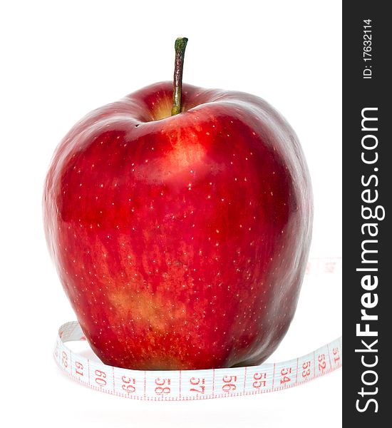 Red apple with centimeter isolated on white