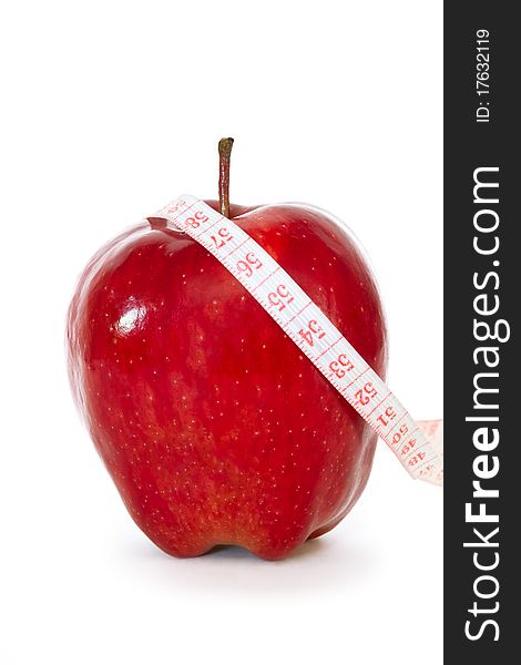 Red apple with centimeter isolated on white