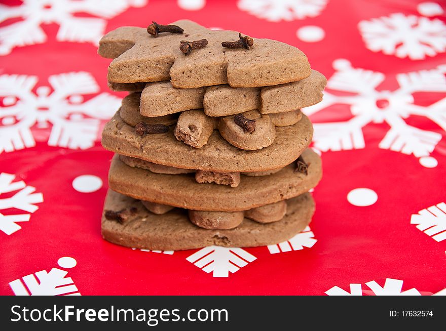 Stack Of Homemade Gingerbread On Christmas Paper