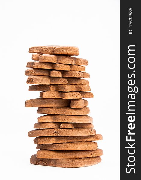 Stack of homemade gingerbread on white isolating background