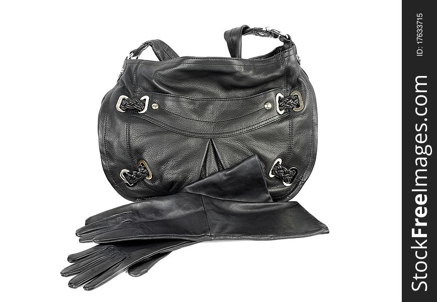 Black leather handbag and pair of gloves