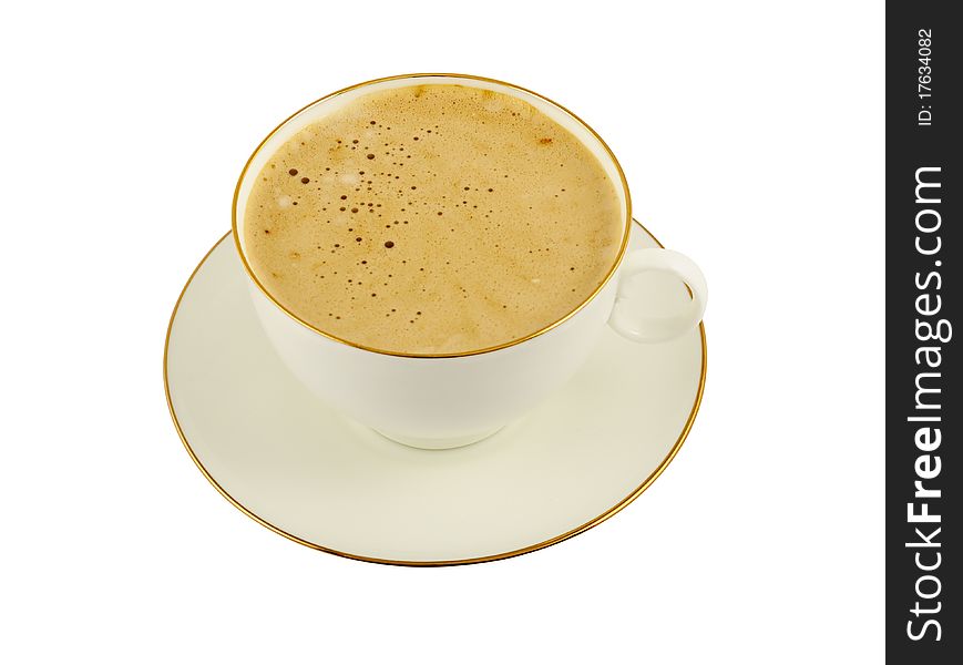 Classic white cup cappuccino and saucer. Top view. Image is isolated on white and the file includes a clipping path. Classic white cup cappuccino and saucer. Top view. Image is isolated on white and the file includes a clipping path.
