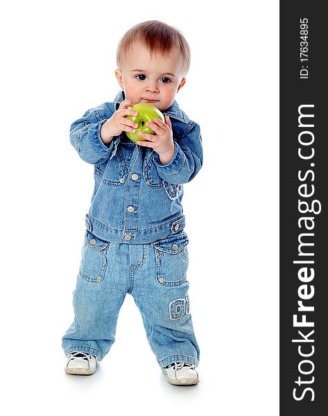 Baby with green apple. Isolated on white background