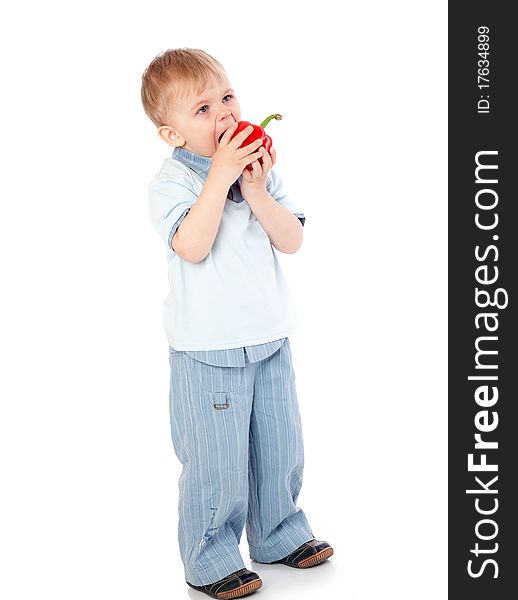 Boy with sweet pepper. Isolated on white