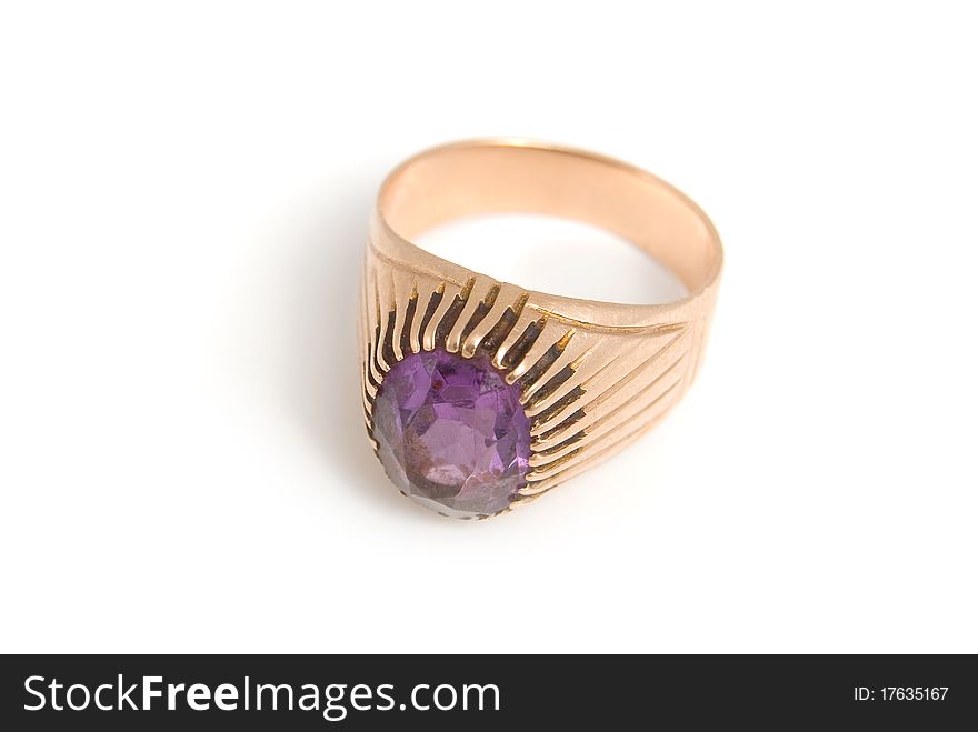 The Golden Ring with amethyst, is isolated on a white background