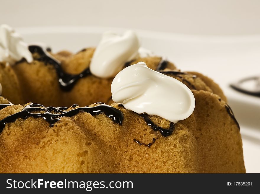 Doughnut topped up with dairy cream.