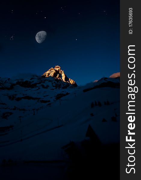 Moon on the matterhorn, italian alp.