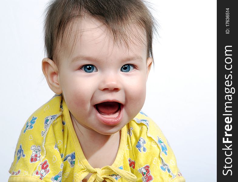 The small child on a white background