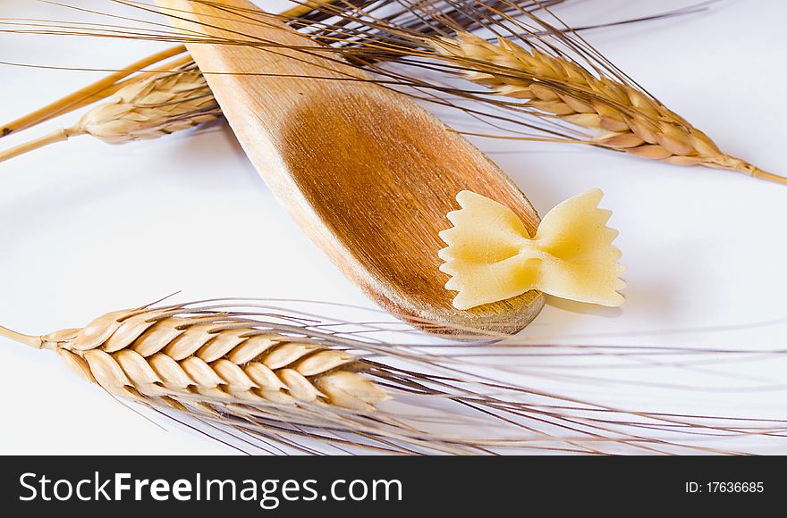 Closeup of italian food and natural spike on white background. Closeup of italian food and natural spike on white background