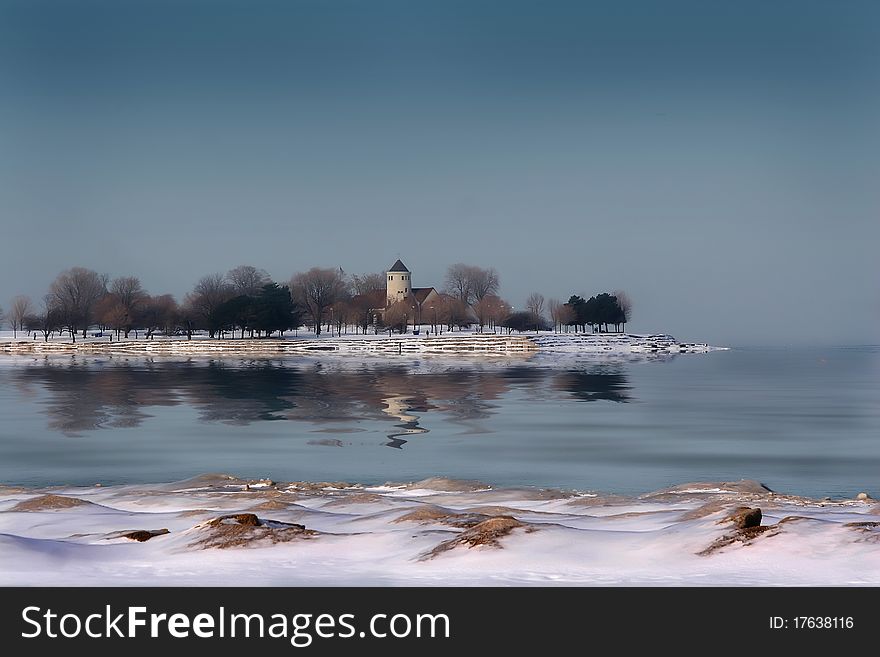 Promontory Point (known locally as The Point) is a man-made peninsula jutting into Lake Michigan. It is located in Chicago's Burnham Park. Promontory Point (known locally as The Point) is a man-made peninsula jutting into Lake Michigan. It is located in Chicago's Burnham Park.