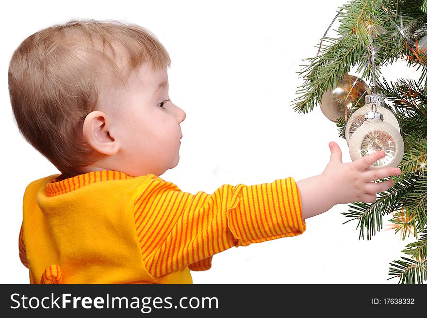 The child and a fur-tree toy