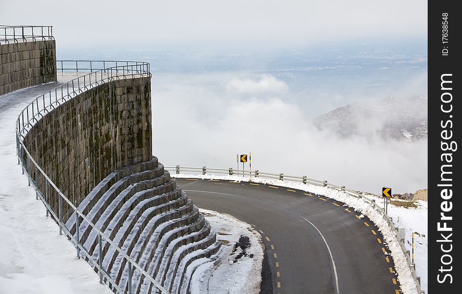 Mountain road near Lagoa Comprida Dam Serra da Estrela – mountain range in Portugal (Mountain Range of the Star). Mountain road near Lagoa Comprida Dam Serra da Estrela – mountain range in Portugal (Mountain Range of the Star)