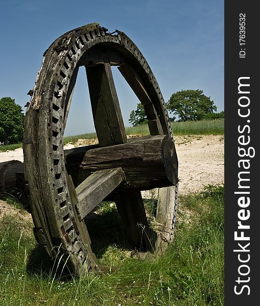 Wooden wheel - remnant of a windmill. Wooden wheel - remnant of a windmill
