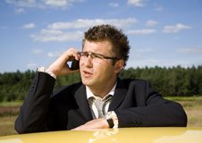 Businessman Talking On Mobile Phone Royalty Free Stock Image