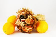 A Bouquet And Three Oranges Royalty Free Stock Photography A Bouquet And Three Oranges Royalty Free Stock Photography