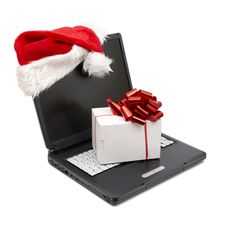 Santa Hat On A Laptop Royalty Free Stock Photography Santa Hat On A Laptop Royalty Free Stock Photography