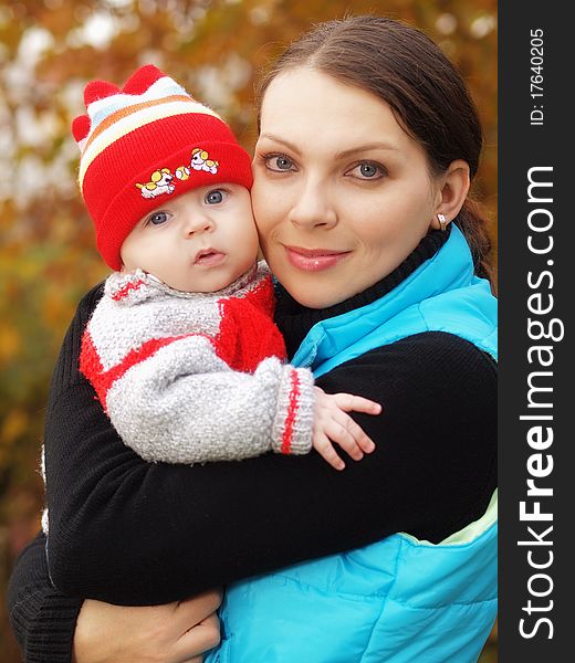 Mother with her baby during autumn. Mother with her baby during autumn
