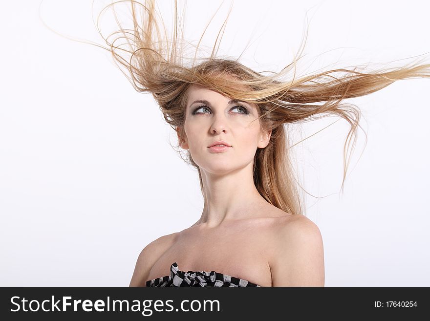 Portrait of young beauty woman with fluttering hair. Portrait of young beauty woman with fluttering hair