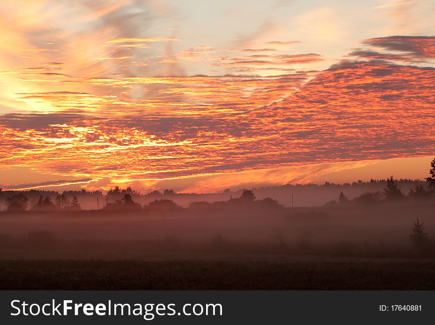 Beautiful flaiming red sunrise in countryside. Beautiful flaiming red sunrise in countryside