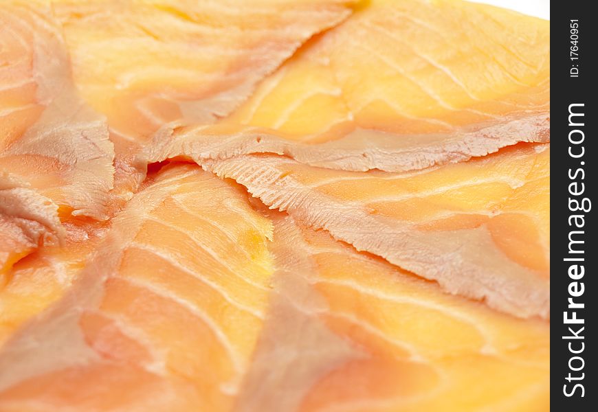 Delicious smoked salmon fillet closeup. Delicious smoked salmon fillet closeup