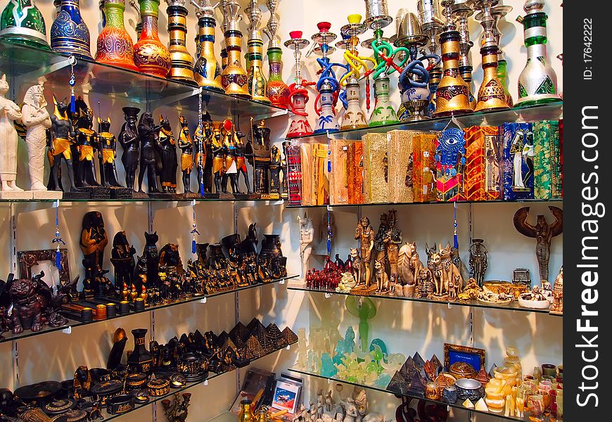 Glass shelves with Egyptian souvenirs