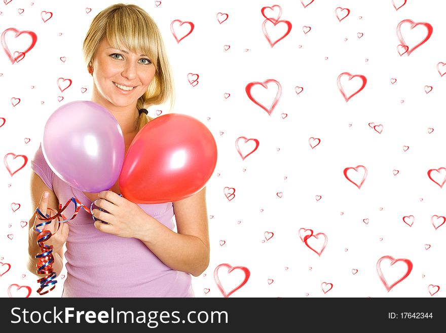 Close-up of a beautiful young woman with colorful balloons balloons. On the background of red hearts. Close-up of a beautiful young woman with colorful balloons balloons. On the background of red hearts
