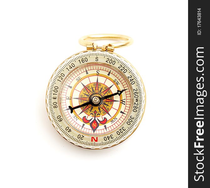 Old styled, gold compass on a white background.