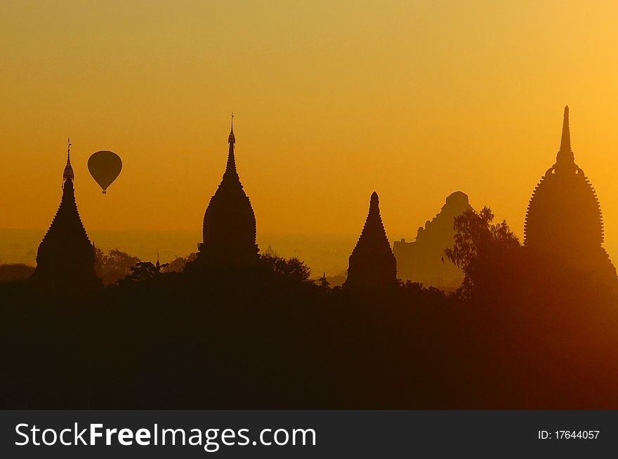 Myanmar sightseeing: Balloon rider over Temples of Bagan at sunrise. Myanmar sightseeing: Balloon rider over Temples of Bagan at sunrise