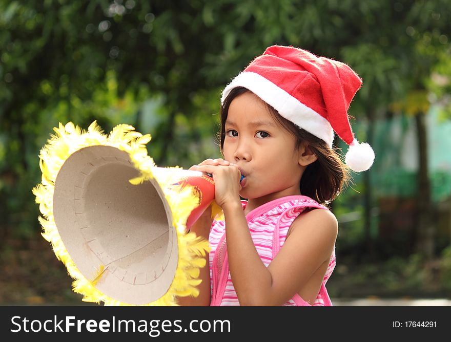 Little asian girl celebrating christmas. Little asian girl celebrating christmas