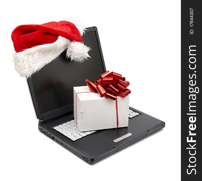 Santa Hat on a Laptop isolated on white