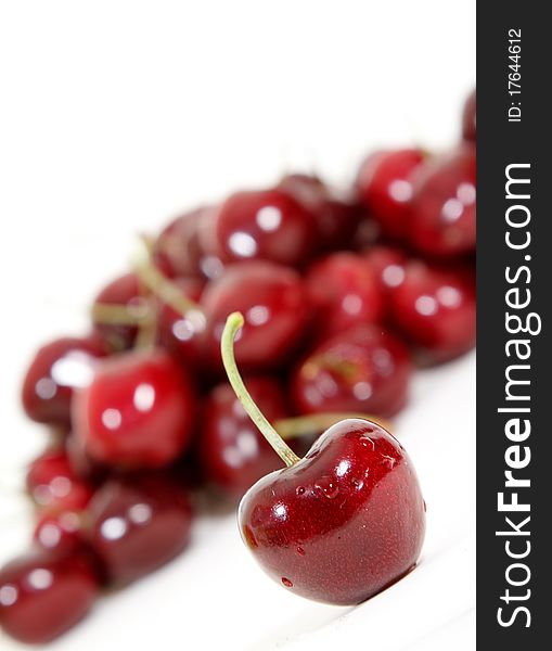 Fresh red cherry isolated on white background