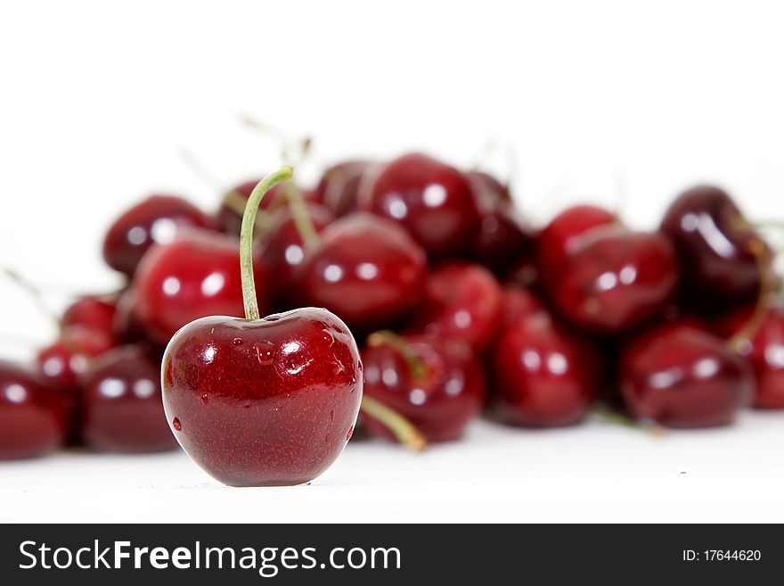 Fresh red cherry isolated on white background