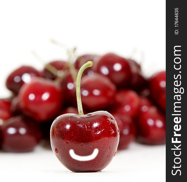 Fresh red cherry isolated on white background