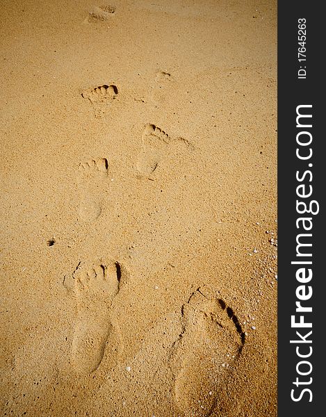 Footprints in the sand, used to background