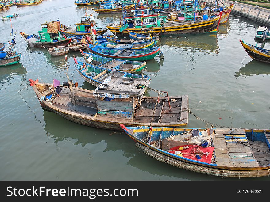 Fishermans boat on the river Phan Thiet, Vietnam, province Binthuan, Phan Thiet town. Fishermans boat on the river Phan Thiet, Vietnam, province Binthuan, Phan Thiet town