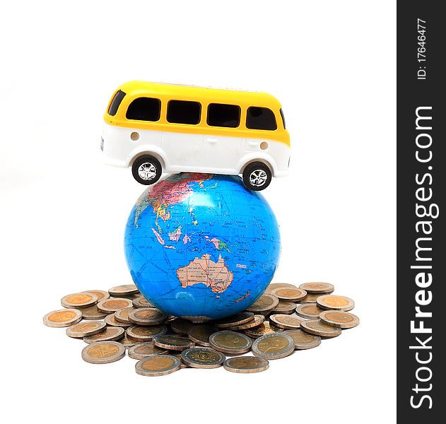 Globe And Car On The Pile Of Coins - Isolated