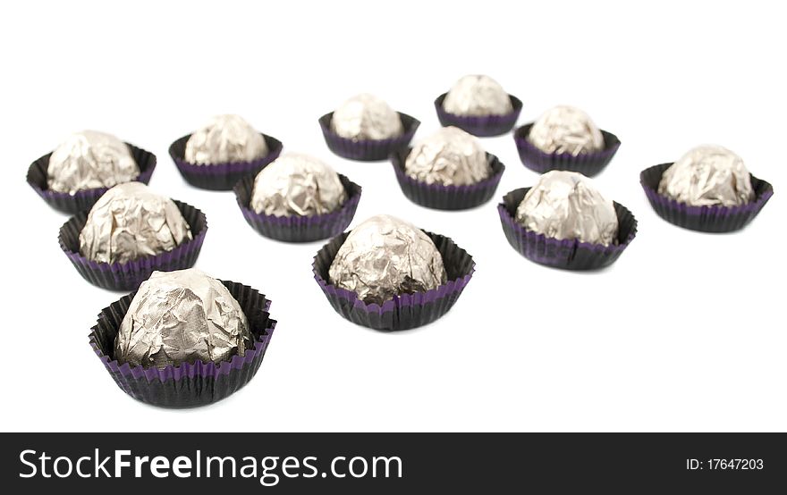 Chocolate candy wrapped in a white background