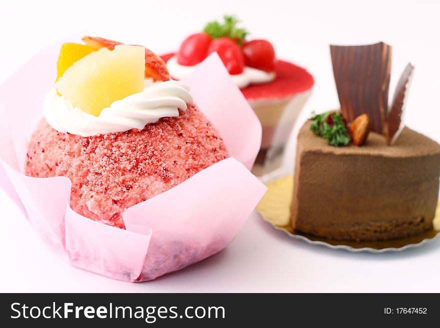 Mousse cake, chocolate mousse cake and raspberry cake. Mousse cake, chocolate mousse cake and raspberry cake.