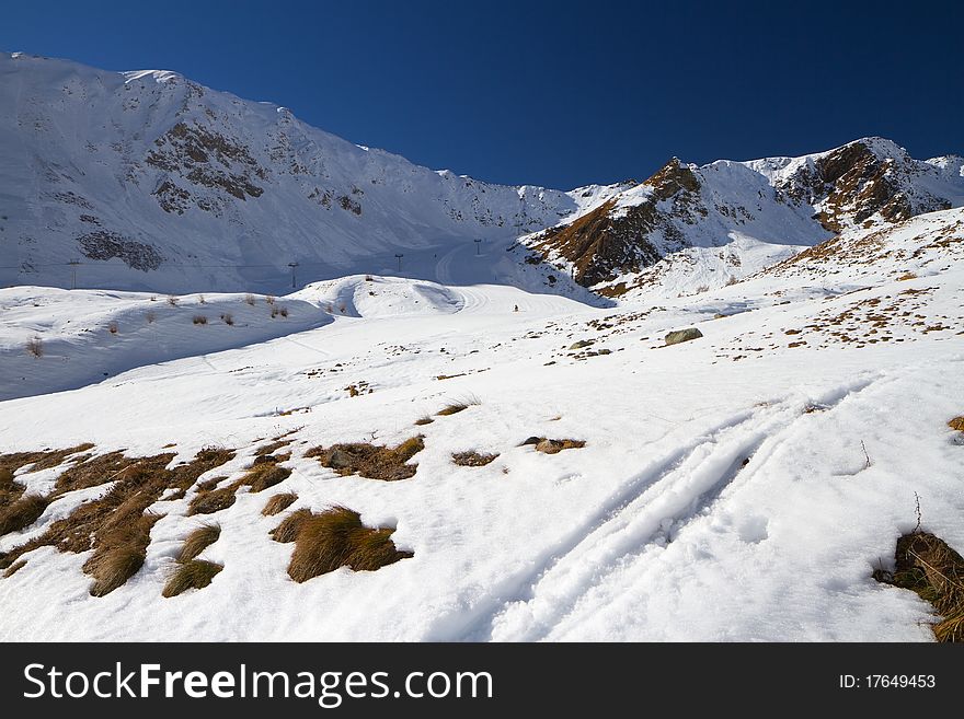 Tonale Pass at 1884 meters on the sea-level, after a winter snowfall. Trento province, Trentino-Alto Adige region, Italy. View of Tonale Occidentale ski run