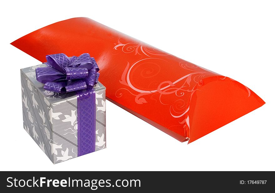 Red and silver box with gifts for Christmas. photo on a white background. Red and silver box with gifts for Christmas. photo on a white background.