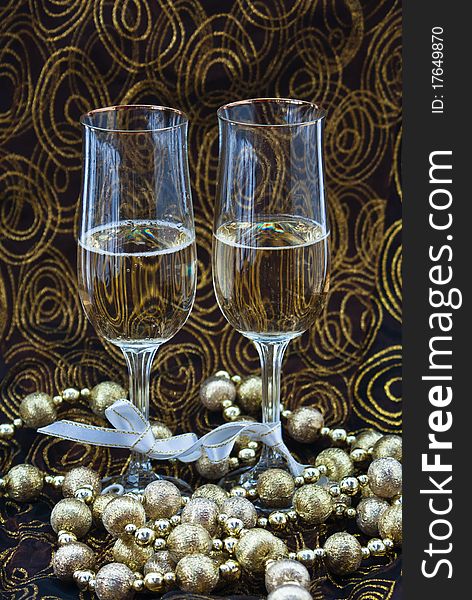 Two Glass Of Champagne United With Decorative Tape