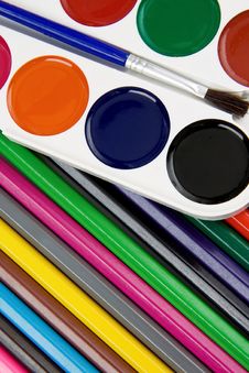 Painters Palette And Brush On Pencils Stock Images Painters Palette And Brush On Pencils Stock Images