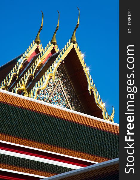 Detail of ornately decorated temple roof in bangkok, thailand