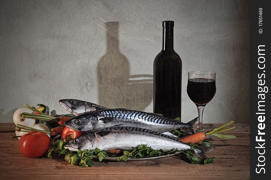 A raw dinner with wine and fish