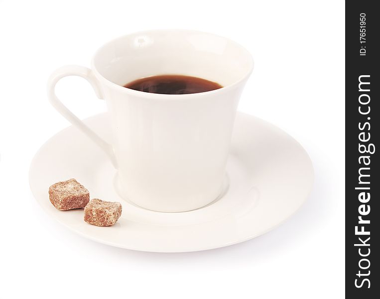 A cup of morning coffee with two sugar cubes. A cup of morning coffee with two sugar cubes