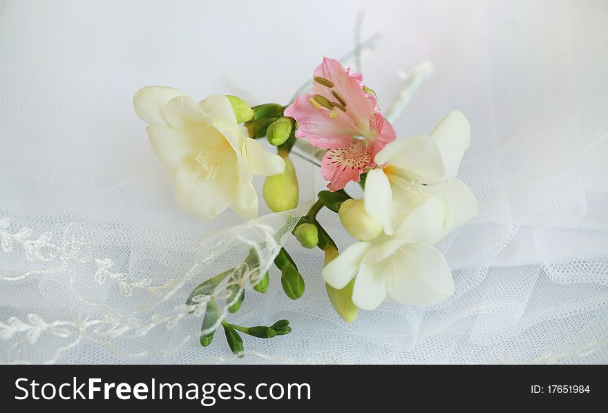 Freesia decor on wedding dress